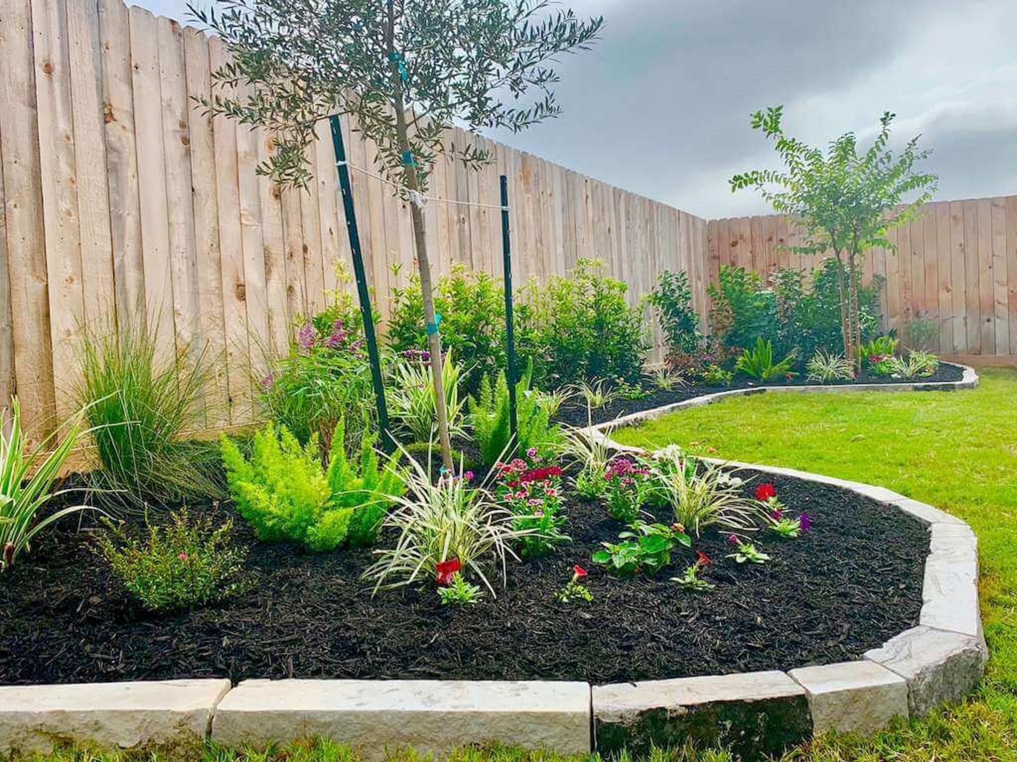 Manicured flower bed with mulch