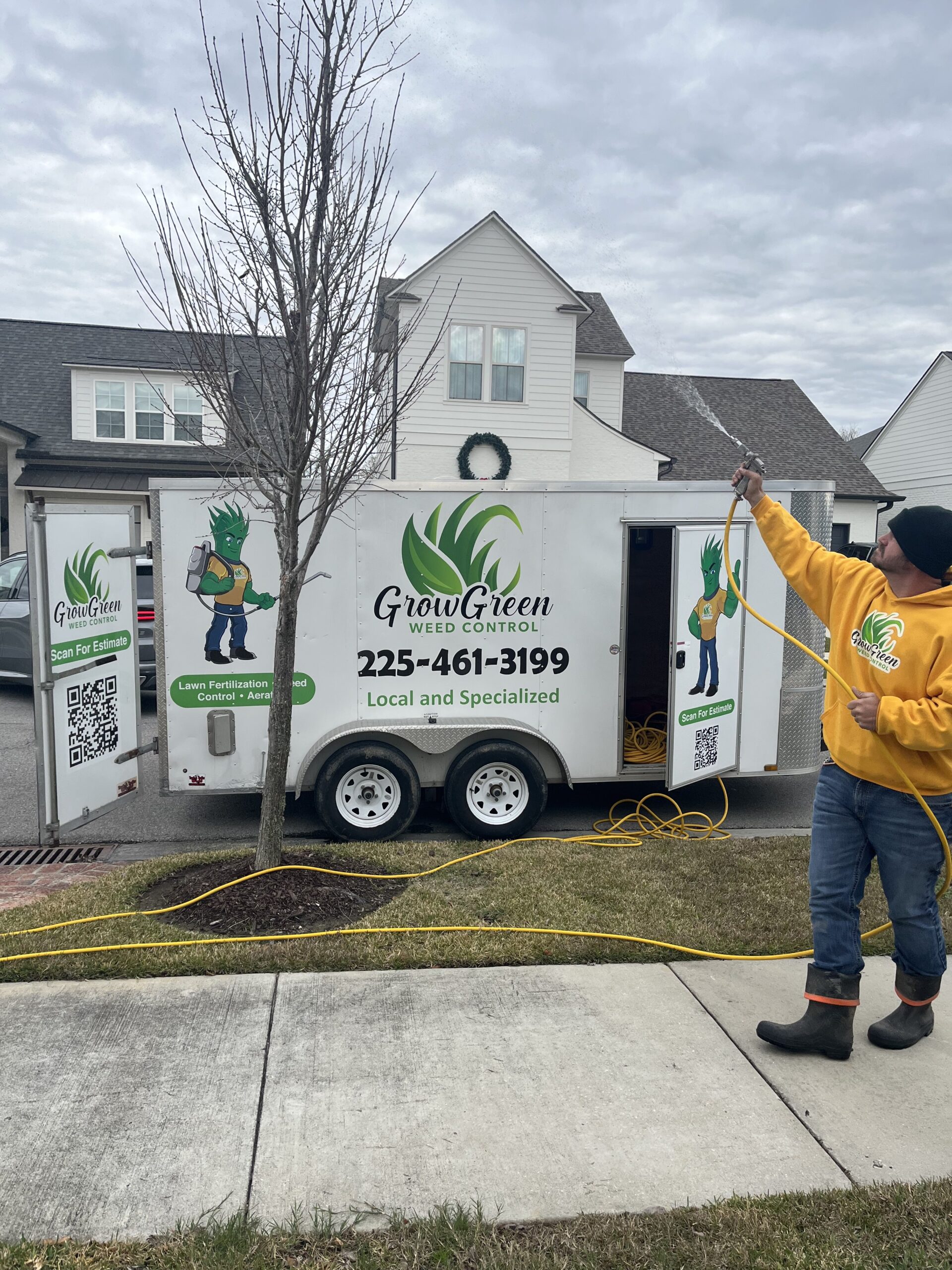 Kyle performing tree and shrub care in Baton Rouge for Grow Green Weed Control